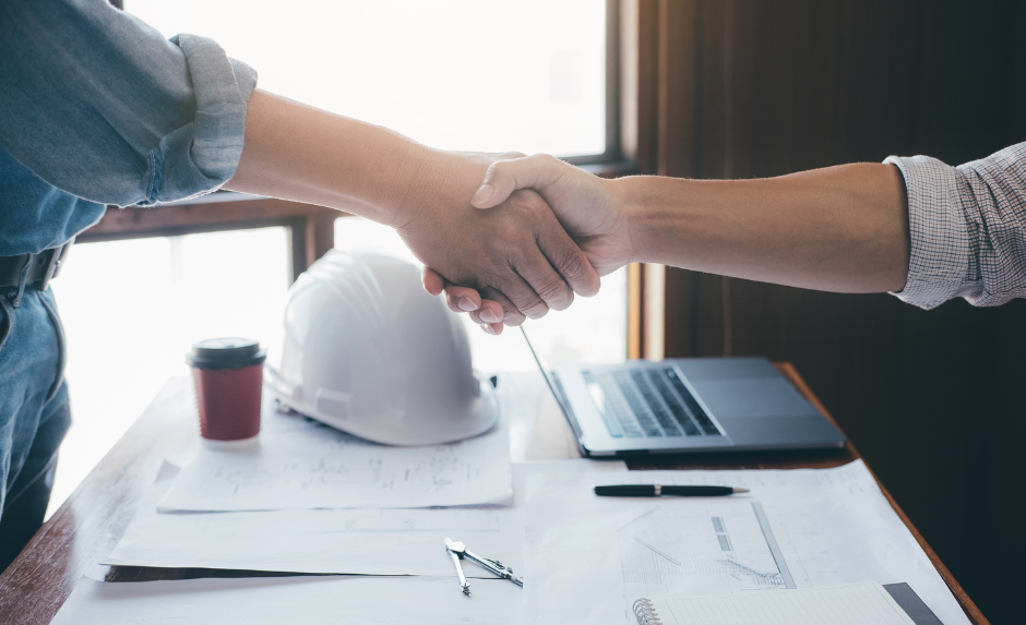 Two people shaking hands.